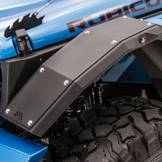 Close-up of the durable steel construction of the front fender flares.