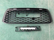 Black ABS front grille with "TOYOTA" emblem